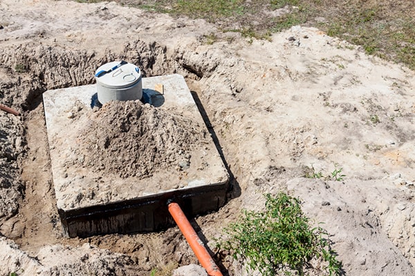 signs that your septic tank needs pumping include slow draining sinks, foul odors, and sewage backups in the house